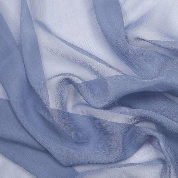 A close-up image shows a translucent, light blue fabric draped in soft folds, revealing its sheer quality.