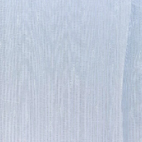 A close-up of light blue, vertically textured bedroom curtain fabric.