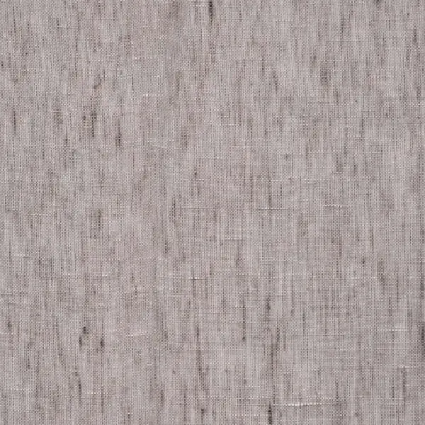 A close-up of light gray bedroom curtain fabric with faint pink and brown threads.
