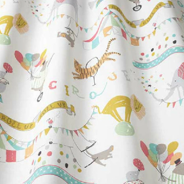 Kids curtain fabric with a whimsical circus theme, including lions, cats, balloons, and banners on a white background.