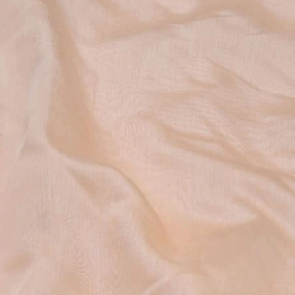 Sheer beige curtain fabric.