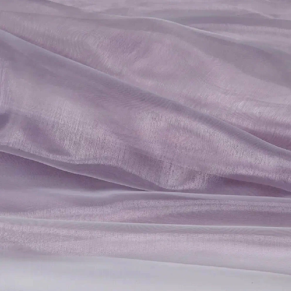Sheer, lavender fabric with visible folds and creases, showing how light passes through it.