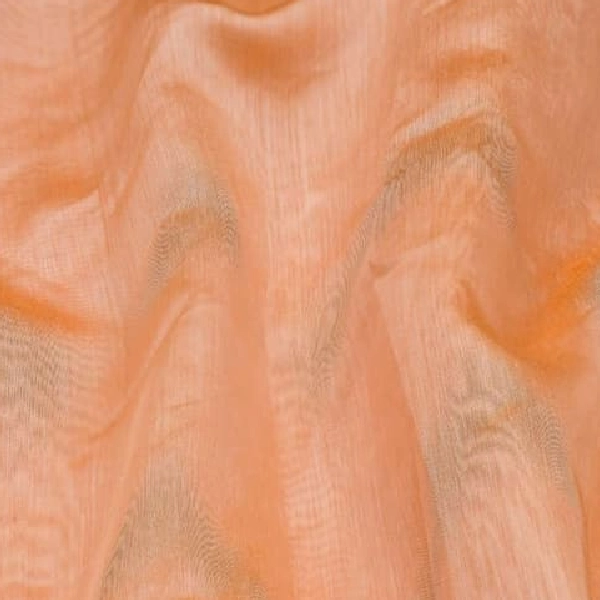 Sheer peach curtain fabric.