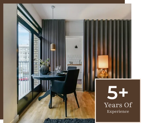 Luxury black curtains in a modern dining room.